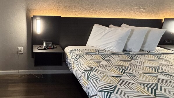 Deluxe Room, 1 King Bed, Non Smoking | 1 bedroom, iron/ironing board, free WiFi, bed sheets