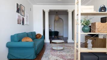 Comfort Apartment | Living area | 36-inch TV with cable channels