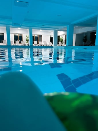 Indoor pool, open 10:00 AM to 9:00 PM, sun loungers