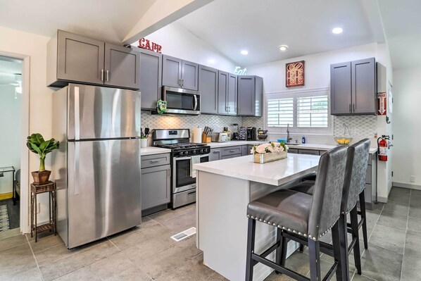 Fridge, microwave, stovetop, coffee/tea maker