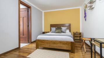 Premium bedding, down duvets, blackout curtains, iron/ironing board