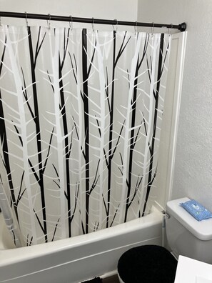 Combined shower/tub