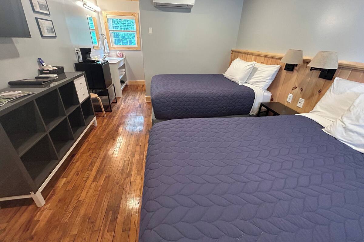Deluxe Room, 2 Double Beds, Refrigerator | Premium bedding, WiFi (free), bed sheets