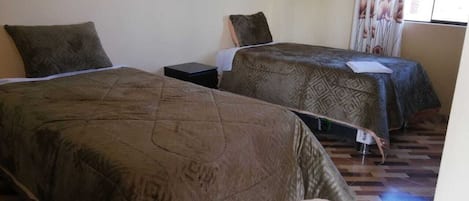 Yhden hengen perushuone | Vuodevaatteet