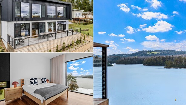 A modern house with a deck, a bedroom with a large window, and a lake view. - Piccolo Segreto Lake Conjola (Lake Conjola)