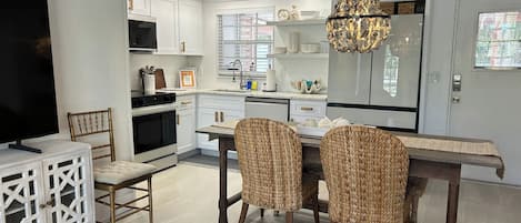 Coffee/tea maker, fridge, microwave, oven