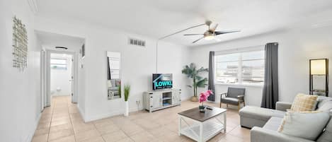 Deluxe 1-Bedroom King w/ Kitchen & Sofa Bed | Living area | 42-inch Smart TV with digital channels
