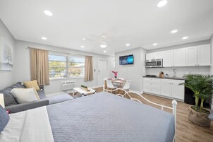 Standard Queen Studio w/ Kitchen & Sofa Bed | Pillowtop beds, laptop workspace, iron/ironing board, free WiFi