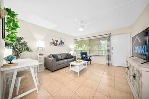 Deluxe 1-Bedroom Two Double w/ Kitchen & Sofa Bed | Living room | 42-inch Smart TV with satellite channels, TV, Netflix