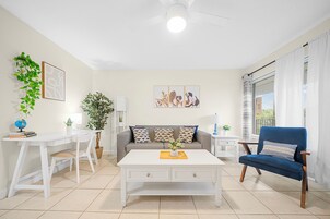 Deluxe 1-Bedroom King w/ Kitchen & Sofa Bed | Living area | 42-inch Smart TV with satellite channels, TV, Netflix