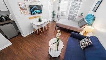 Superior Queen Studio w/ Kitchenette & Futon | Pillowtop beds, iron/ironing board, free WiFi, bed sheets