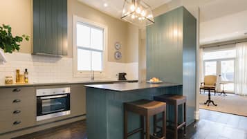 Coachman's Cottage | Private kitchen | Espresso maker, coffee/tea maker, electric kettle, dining tables