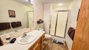 Shower, hair dryer, towels, soap