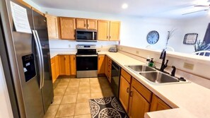 Fridge, microwave, oven, stovetop - 5th Fairway Retreat is located on the golf course and features great amenities! (Red Lodge)