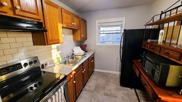Refrigerador, microondas, horno y parrilla de estufa