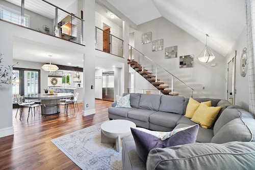 High-end home w/ fireplace, gourmet kitchen, sauna, game rm/ large yard/fire pit