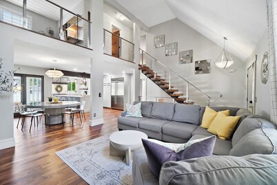 High-end home w/ fireplace, gourmet kitchen, sauna, game rm/ large yard/fire pit