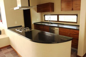 Microwave, stovetop, dishwasher, coffee/tea maker