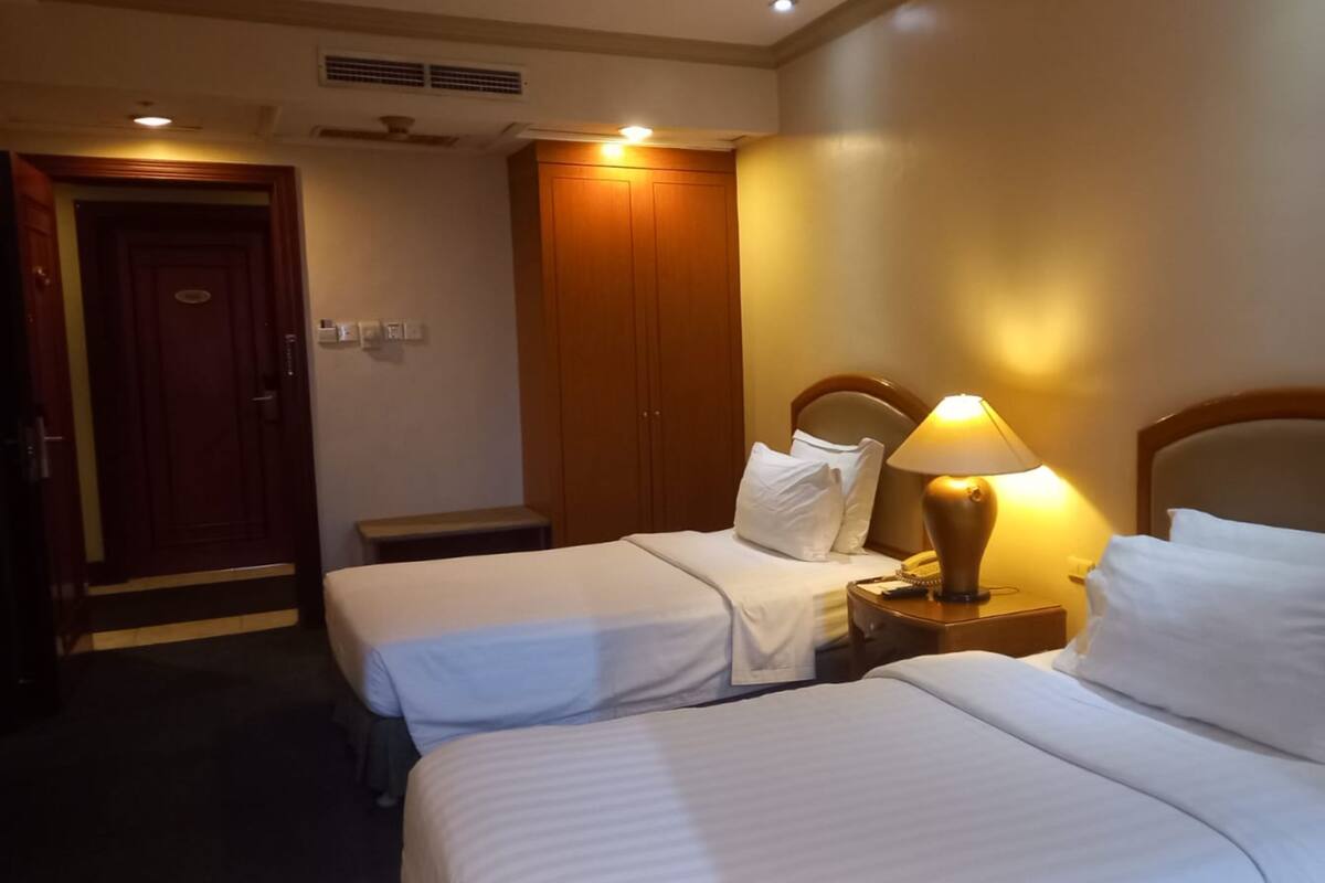 Habitación Deluxe con 2 camas individuales | Wifi gratis y ropa de cama