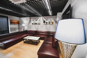 Economy Room | Living area | 23-inch LCD TV with digital channels, Netflix, pay movies - Address Boutique Hotel (Tbilisi)