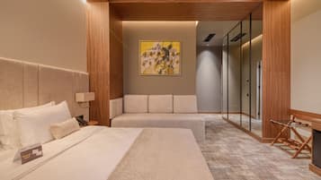 Superior Deluxe Room | Minibar, in-room safe, desk, laptop workspace