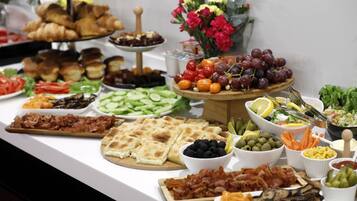Daily buffet breakfast (USD 10 per person)