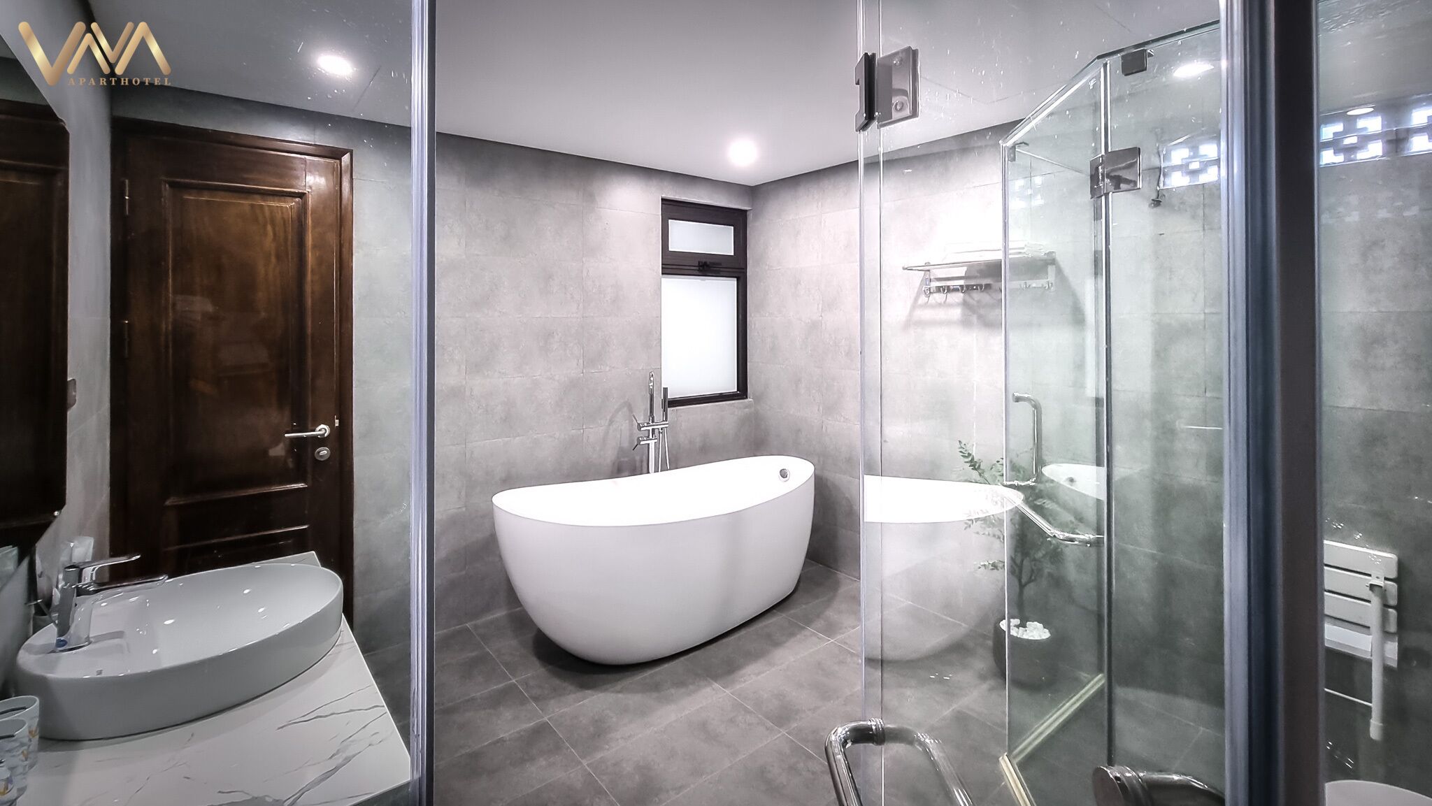 Shower, rainfall showerhead, designer toiletries, hair dryer