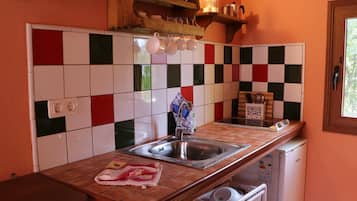 Fridge, toaster, cookware/dishes/utensils