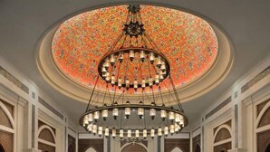 A luxurious interior with a central pool, ornate ceiling, and traditional design elements. - Jumeirah Zabeel Saray Royal Residence Lagoon Villa (Dubai)