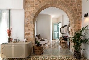 Superior Suite | Minibar, in-room safe, blackout drapes, iron/ironing board