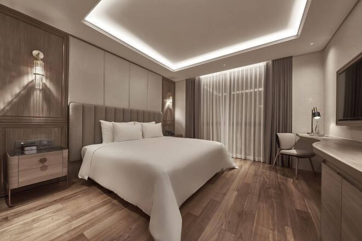 Hochwertige Bettwaren, Daunenbettdecken, Minibar, Zimmersafe
