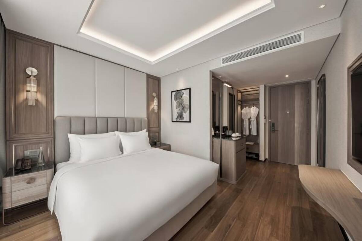 Hochwertige Bettwaren, Daunenbettdecken, Minibar, Zimmersafe