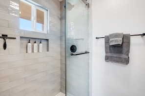 Shower, hair dryer, towels