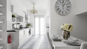 Fridge, microwave, oven, high chair