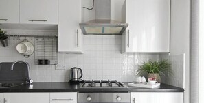 Fridge, microwave, oven, high chair