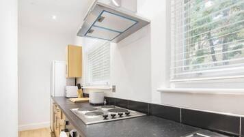 Fridge, microwave, oven, cookware/dishes/utensils