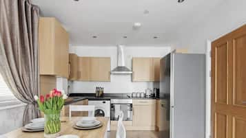 Fridge, microwave, oven, cookware/dishes/utensils