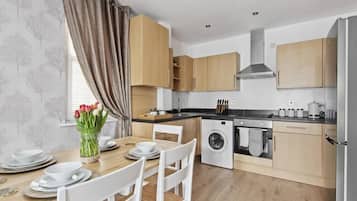 Fridge, microwave, oven, cookware/dishes/utensils