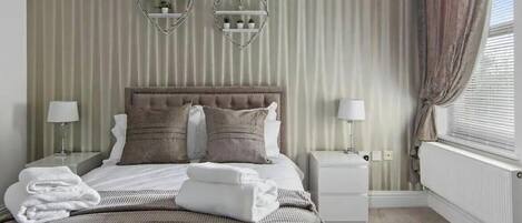 2 bedrooms, iron/ironing board, WiFi, bed sheets