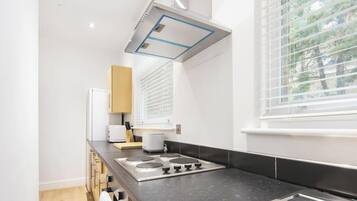 Fridge, microwave, oven, cookware/dishes/utensils