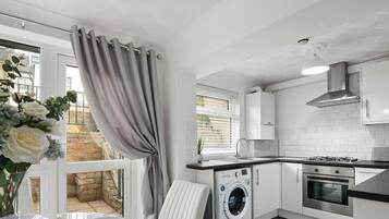 Fridge, microwave, oven, high chair