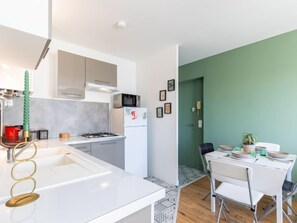 Fridge, microwave, dishwasher, high chair