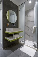 Shower, hydromassage showerhead, designer toiletries, hair dryer