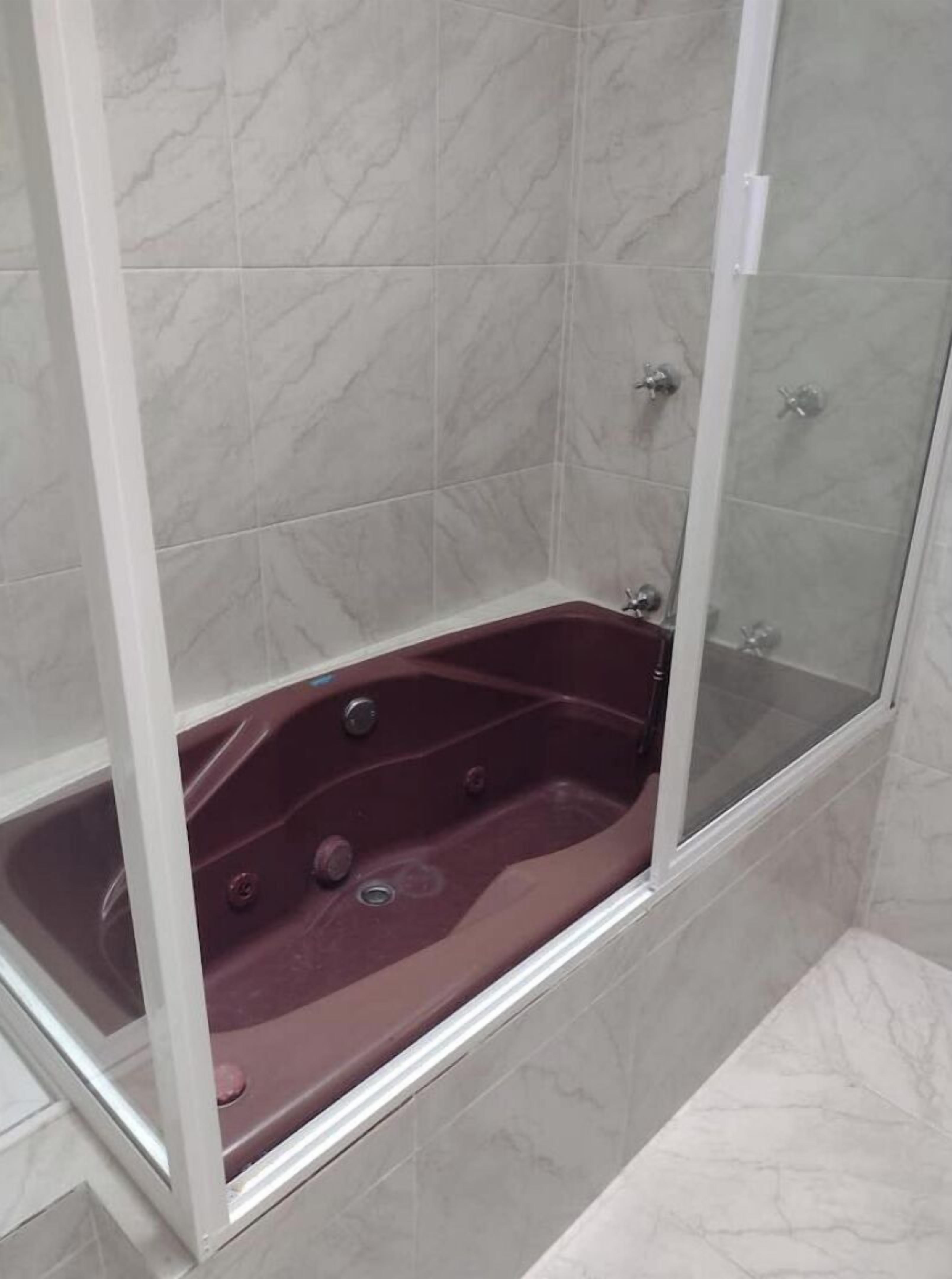 Shower, towels, soap, toilet paper