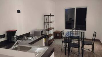Fridge, microwave, stovetop, coffee/tea maker
