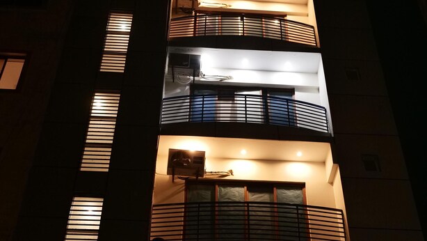 A multi-story building with balconies and windows. - Remarkable Diamond Apartment Dha Defense Karachi (Karachi)