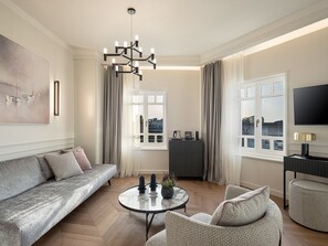 Suíte luxo, vista para o mar | Área de estar