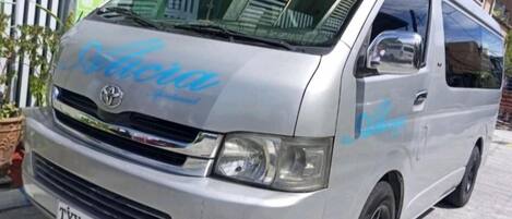 A silver van with a blue logo and the text "Viva" on the front.