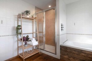 Bathtub, hair dryer, towels