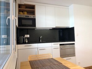 Fridge, microwave, dishwasher, coffee/tea maker